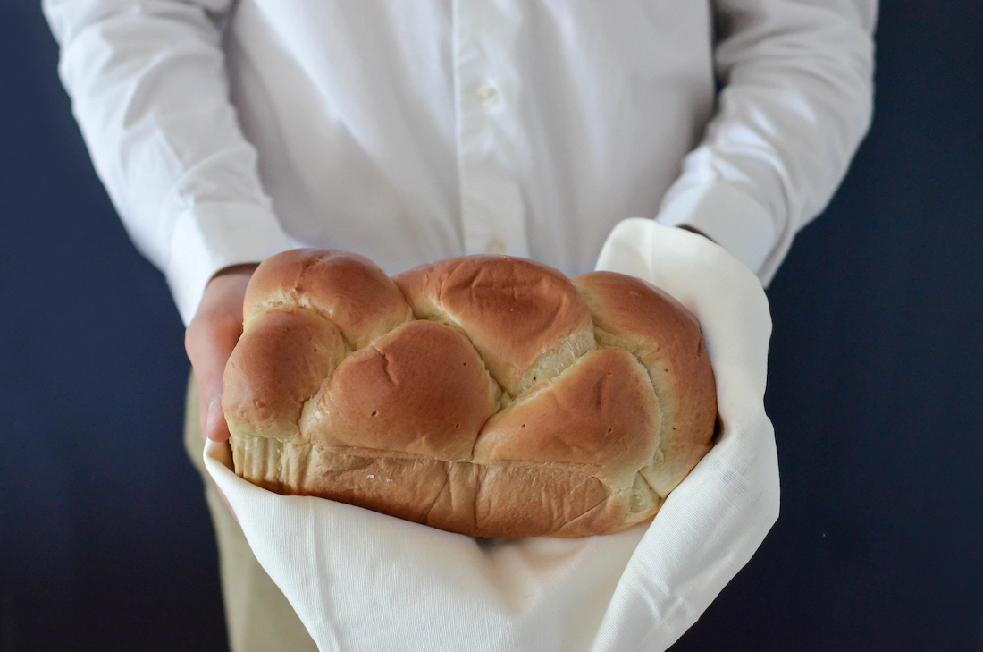 Our bakers serve fresh breads daily with love